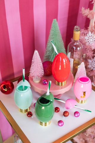 Extra Bright Mini Light Sippers SetSay cheers to the holidays with this set of four mini holiday light cup sippers! In festive colors and with a built-in spill-proof stopper too, these are the ideal pPacked Party