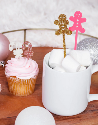 Pink Gingerbread Men Beverage Mixing Sticks 
Mix up the holiday cheer with a sprinkle of Christmas spirit! Our Pink Gingerbread Men Beverage Mixing Sticks are the perfect festive addition to your hot chocolatFriendlily Press