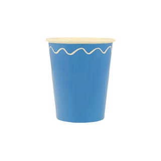 A blue and white Mixed Wavy Line Cup from Meri Meri that will stand out on your party table.