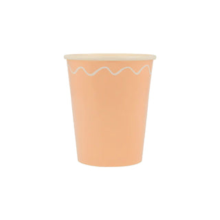 A Mixed Wavy Line Cup by Meri Meri with a white rim is perfect for any party table.