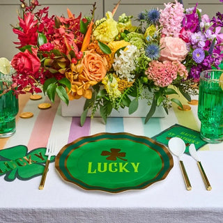 Shenanigans Dinner PlateThese stunning paper plates will make you want to host a party at the first chance you get! These ruffled foil edge plates display a 'Lucky' text below a four leaf cSophistiplate