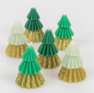 Green Mini Tree CandlesThese candles may be little, but they pack a big decorative punch! The combination of the green trees, beautifully finished with a gold glitter base, will look festiMeri Meri