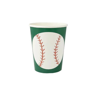 A disposable baseball cup, crafted from FSC paper, with a theme featuring a white center panel adorned with red stitching designs that mimic the look of a baseball, set against a green background by Meri Meri.