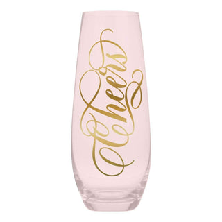 Champagne Glass - CheersSip in style with this cute and fun stemless champagne glass.
Features:

Pink tinted glass with "Cheers" in gold lettering
Traditional size
Size:2.75" x 6.25" H / 10Creative Brands