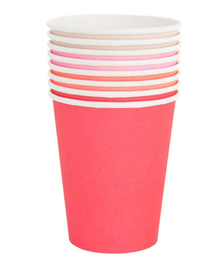 A stack of Pretty In Pink Set disposable paper cups in assorted colors, with a prominent one in front, designed by Oh Happy Day in San Francisco and typically used for serving beverages at casual events or for takeout.