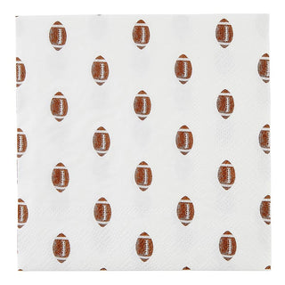 A white Slant paper tableware napkin with a repeated pattern of brown American footballs, suggesting a Football Party in a Box - Tailgate event or gathering.
