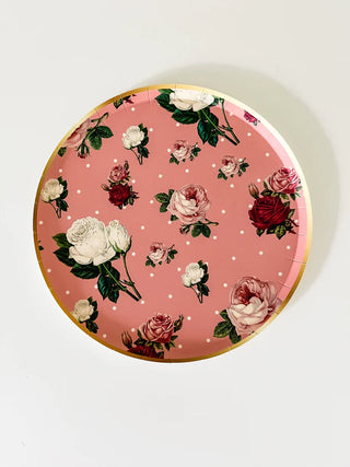 A Josi James Patisserie Small Plate with roses and polka dots on it.