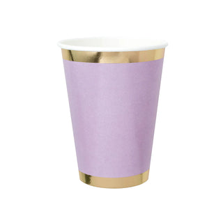 A single, empty, Posh Lilac You Lots paper cup from Jollity & Co with gold foiled rims on the top and bottom edges, isolated on a white background, likely intended for elegant party occasions.