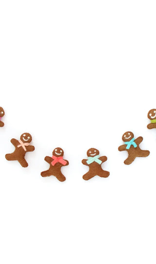Gingerbread Men Christmas Holiday Felt Garland
6’ long adjustable felt garland. 8 gingerbread men with colorful scarves that are 4” tall.
Made in NepalKailo Chic