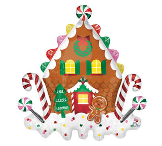 A colorful illustration of a whimsical gingerbread house adorned with candy canes, peppermint swirls, and a smiling gingerbread man, set against a white background.