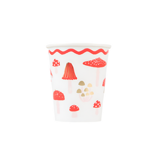 The Merry Mushrooms Cups by Meri Meri feature a festive design with a red wavy line pattern at the rim and various red, white, and brown mushrooms, making them perfect for adding charm to your holiday meal.