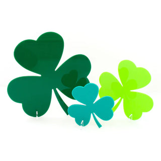 Three Kailo Chic acrylic shamrocks in green and blue on a white background, perfect for St. Patrick's Day decor.