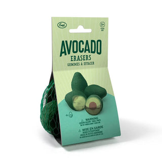 Fred and Friends Avocado Erasers come in a netted bag containing four mini erasers with colorful layers. The packaging indicates suitability for ages 5 and up and includes a warning label.