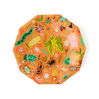 The Daydream Society's Backyard Bugs Small Plates feature delightful insect and plant designs against a white background—ideal for any bug lover. The neon bugs provide a playful accent to this charming item.