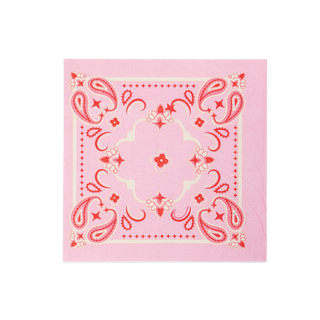 A pink My Mind's Eye bandana paper cocktail napkin with a symmetrical red floral and paisley design, displayed on a black background.