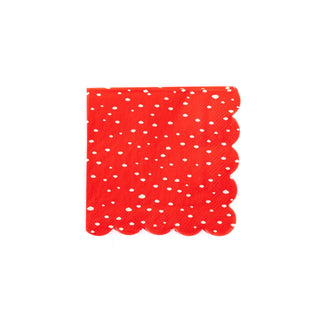 Believe Dot Cocktail Napkin by My Mind's Eye, featuring red fabric with white polka dots and elegant scalloped edges, folded in quarters—perfect for setting a festive mood.