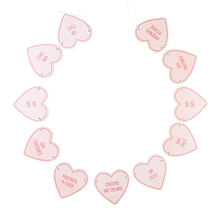 Chipboard Heart BannerMake a statement with this stylish, heart-shaped chipboard banner! Featuring a sweet pink color and embossed sayings, it's the perfect way to show off your love for My Mind’s Eye