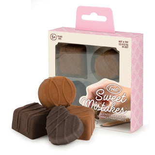 A box labeled "Chocolate Erasers" from Fred and Friends contains four scented erasers shaped like chocolate candies. They are crafted from BPA-free TPU rubber, recommended for ages 5 and up, and should not be considered a toy.