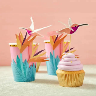 Tropical-themed Ma Fête hummingbird cupcake toppers with gold rims.