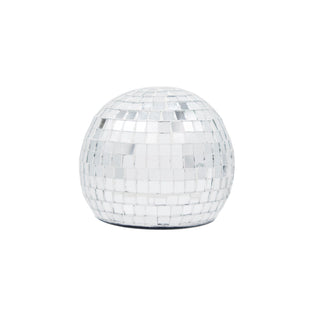 The NPW Disco Bottle Opener, with its spherical shape and reflective mirrored tiles, placed on a white background, makes for the perfect party accessory.