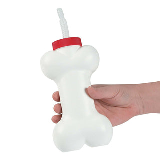 A person holding a Sprinkle BASH Bone Cup with Lids & Straw for kids.