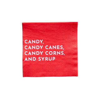 Get ready for your holiday party table with Bonjour Fête's Elf Candy Small Red Napkins, featuring white text listing "Candy, Candy Canes, Candy Corns, and Syrup," made from eco-conscious materials.