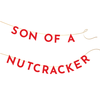 A banner displaying the words "Son of a Nutcracker" in red letters on a string, making it the perfect Elf Son of A Nutcracker Banner by Bonjour Fête for your Elf-inspired Christmas party decoration or Elf movie night.