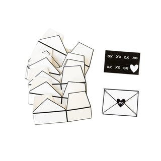 Envelope Treat BoxesThese Envelope Treat Boxes make the perfect Valentine's Day gift! Fill them with your favorite treats, and dress them up with heart stickers in stylish black and whiMy Mind’s Eye