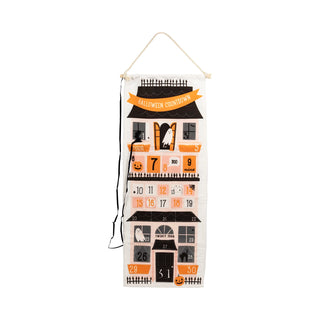 Halloween Felt Countdown Advent by My Mind’s Eye features numbered pockets, ghost illustrations, and "Halloween Countdown" written on top—a perfect addition to your Halloween decor.