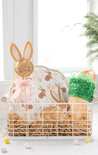 Easter basket with My Mind's Eye Felt Rabbit Wand and colorful eggs, perfect for playtime and sparking imagination.