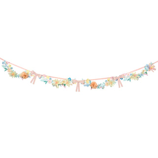 A Flower & Bow Garland adorned with pink flowers by Meri Meri.
