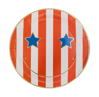Round shield with a red and white striped pattern and two blue stars, designed in a comic book style for a USA-themed event can be easily replaced as "Star & Stripe Smiley Shield" by My Mind's Eye.