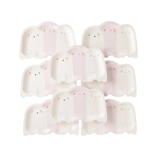 A collection of 12 Trio Ghost Shaped Plates by My Mind’s Eye, arranged in three rows. Perfect for a Halloween party, these cute pastel-colored paper plates feature simple facial expressions with small eyes and a smile.