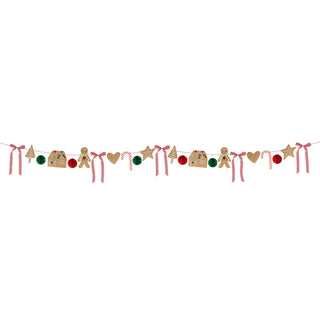 The Meri Meri Gingerbread Garland, featuring festive gingerbread figures, houses, stars, hearts, red and green ornaments, and pink ribbons, adds a charming touch to your Christmas decoration.