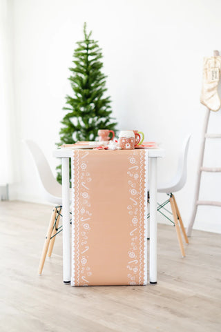 Gingerbread Table RunnerIf you are craving a sweet holiday this Christmas then be sure to pick up our gingerbread table runner. Featuring white frosted candy icons that look good enough to My Mind’s Eye