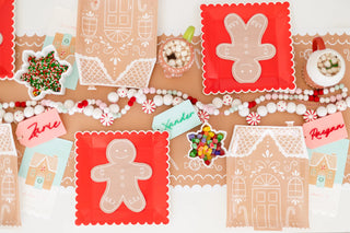 Gingerbread Table RunnerIf you are craving a sweet holiday this Christmas then be sure to pick up our gingerbread table runner. Featuring white frosted candy icons that look good enough to My Mind’s Eye