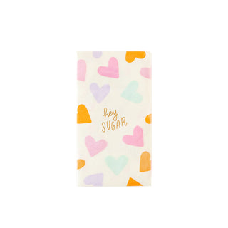 An elegant Gold Foil Hey Sugar guest towel with hearts printed on it by My Mind's Eye.
