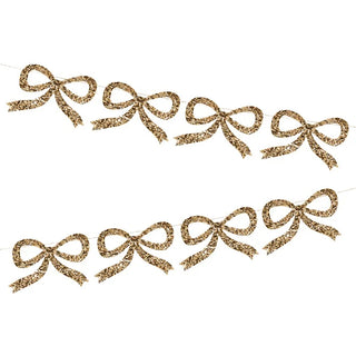 Gold Glitter Bow GarlandBows are back (as if they ever truly went away)! This on-trend garland is guaranteed to add a statement look to any festive celebration. Hang it on your party table,Meri Meri