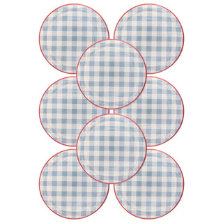 Seven circular Hamptons Chambray Gingham paper plates arranged in a flower shape, each featuring a blue and white pattern with a red border by My Mind's Eye.