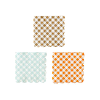 Three Harvest Gingham Paper Cocktail Napkins from My Mind’s Eye in brown, light blue, and orange, arranged in a triangle formation against a white background. Each napkin has scalloped edges, perfect as festive table decorations for your Thanksgiving celebration.