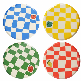 Four round Little Chef Checkered Paper Dinner Plates by Pop! Party Supplies in blue, yellow, green, and red feature small fruit or vegetable illustrations: tomato (blue), broccoli (yellow), apple (green), and lemon (red). Perfect for birthday party decor, these sustainable FSC paper plates are as eco-friendly as they are charming.
