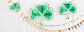 Irish-inspired St. Patrick's Day party decor featuring My Mind’s Eye Hanging Shamrock Honeycomb accents.