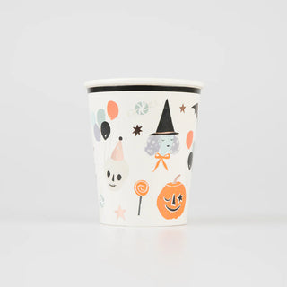 The Meri Meri "It's Halloween!" Cups boast vintage-look Halloween-themed designs including a witch's hat, balloons, a skull, a pumpkin, and various candies on a plain white background—perfect for your party table.