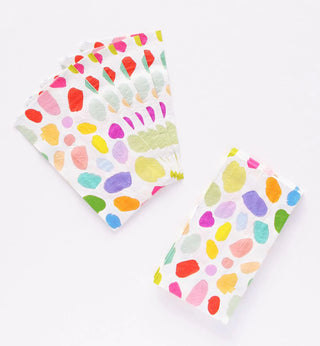 A set of colorful Kindah Dinner Napkins with dots on a white surface, perfect for dinner parties from Oh Happy Day.