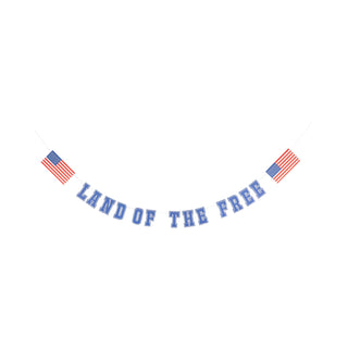 A decorative My Mind’s Eye Land of the Free Banner with the patriotic phrase "land of the free" in blue letters, flanked by two American flags, suspended against a white background, evoking a sense of American pride.