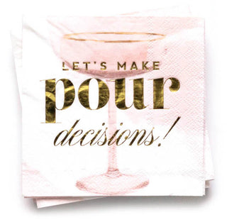 A stack of Let's Make Pour Decisions - Cocktail Party Napkins from Kitty Meow Boutique with a printed image of a coupe glass and the phrase "LET'S MAKE POUR DECISIONS!" in bold gold letters, perfect for party decoration at bridal showers.