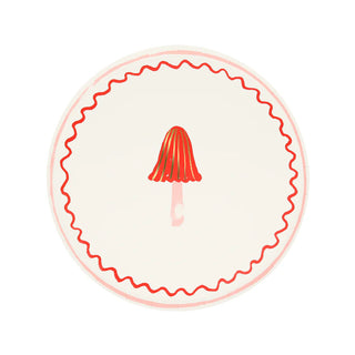 Illustration of a red-capped mushroom with a white stem, centered inside a circular border decorated with wavy red lines and gold foil details, perfect for adding charm to any festive plate design with Merry Mushrooms Side Plates by Meri Meri.