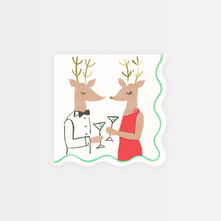 Illustration of two deer wearing formal attire holding martini glasses, with a wavy green border around the edge—Mr. & Mrs. Reindeer Small Napkins by Meri Meri are perfect for adding charm to your festive tableware or as playful cocktail napkins.