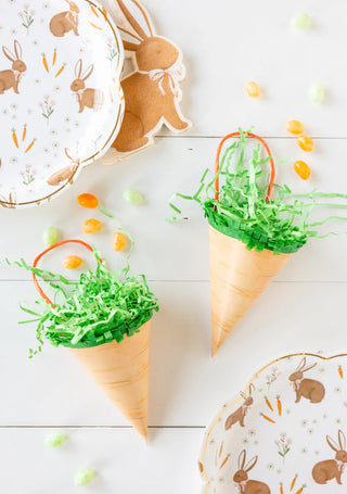 Easter bunny cones and plates with My Mind's Eye Carrot Treat Bags filled with bunny-approved fun treats on a table.