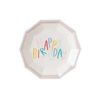 Hexagonal birthday plate with "happy birthday" written in colorful letters and gold foil accents, isolated on a white background. 
Oui Party Hexagon Party Plate by My Mind's Eye.